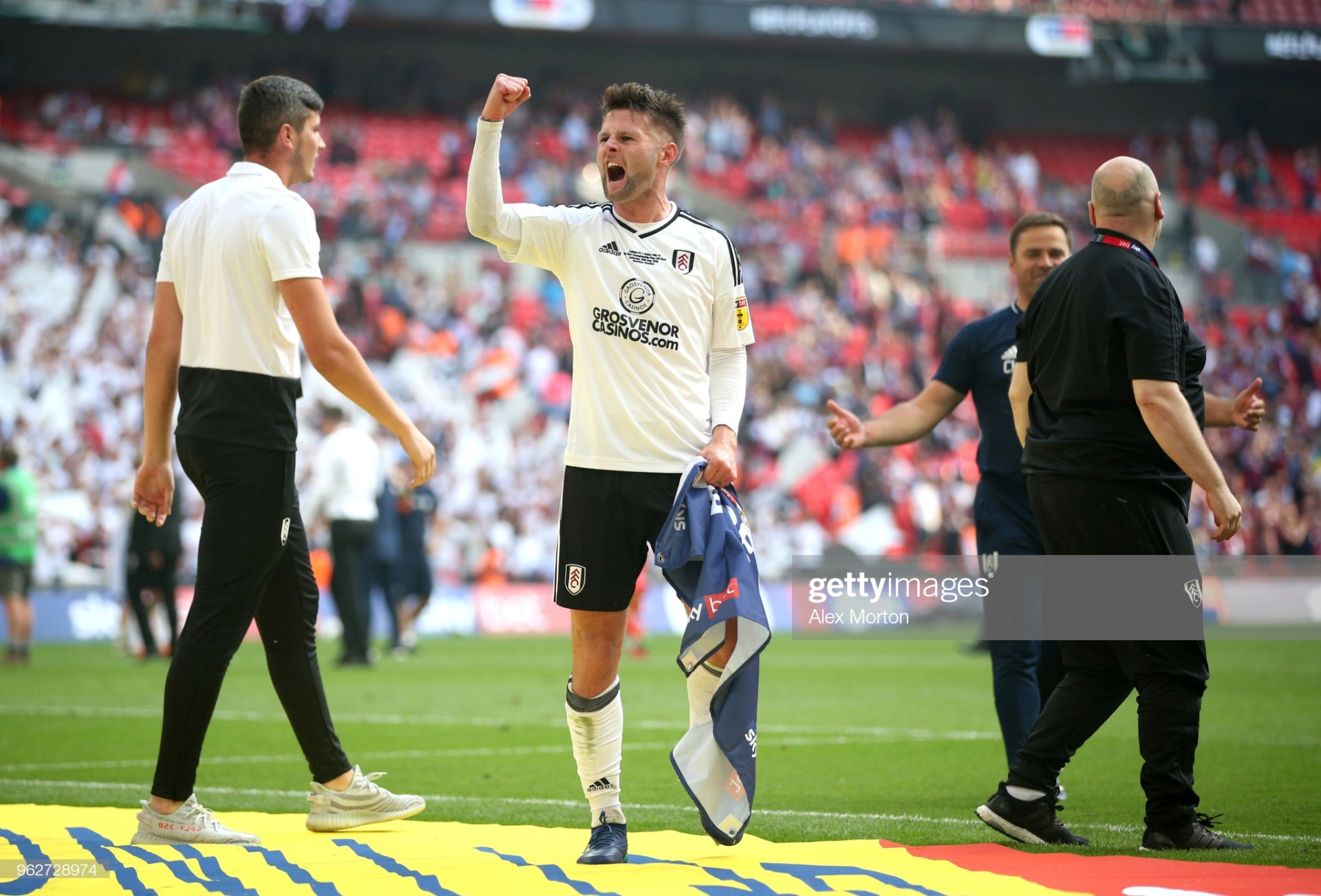 Ollie Norwood celebrates play-off promotion with Fulham back in 2018  (Photo by Alex Morton/Getty Images)
